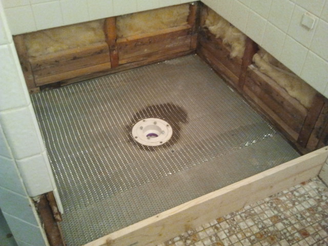shower drain leak tile floor